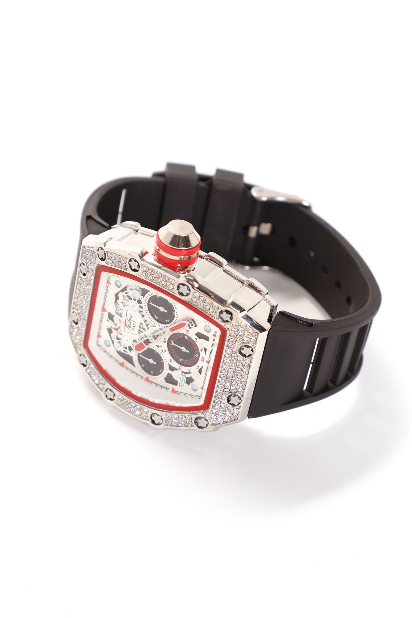 A luxury watch with a silver-tone case encrusted with clear stones, a white dial with red accents, and a black rubber strap, shown on a white background.