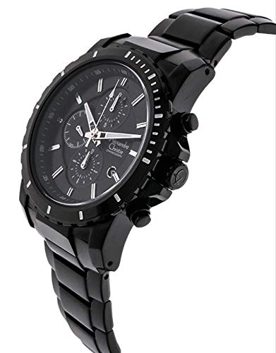 A black chronograph watch with a matching black metal link bracelet, featuring a dark dial with silver-tone hands and indices.