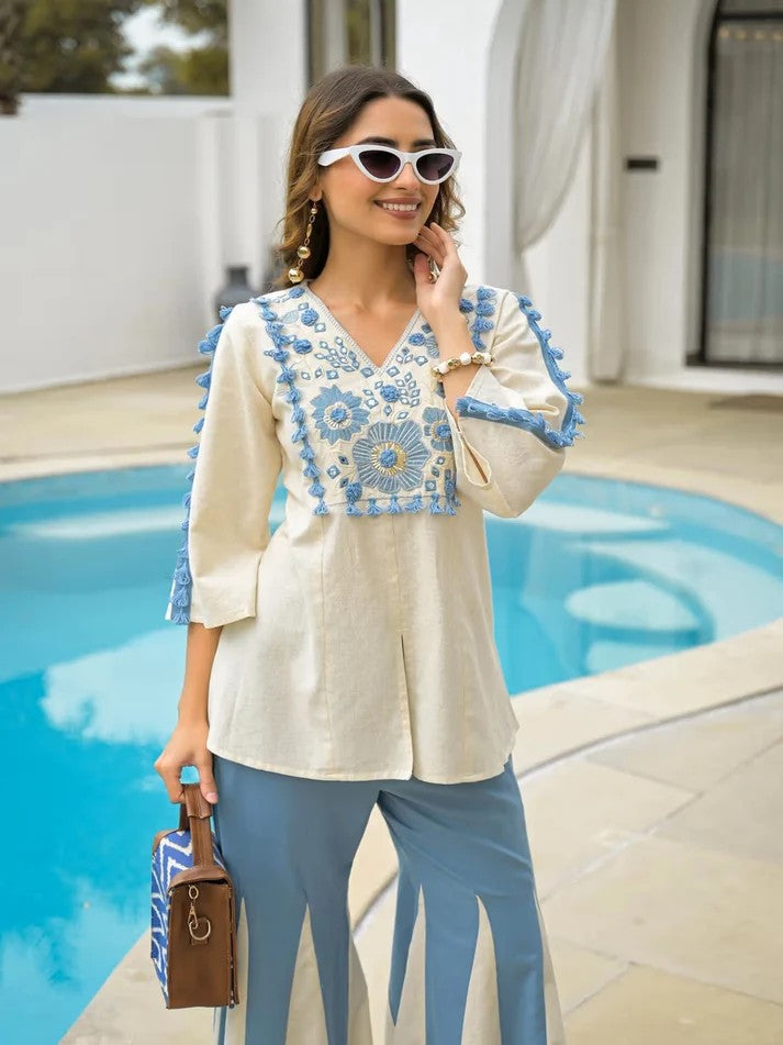 Women Embroidered Tunic & Flared Palazzo Set