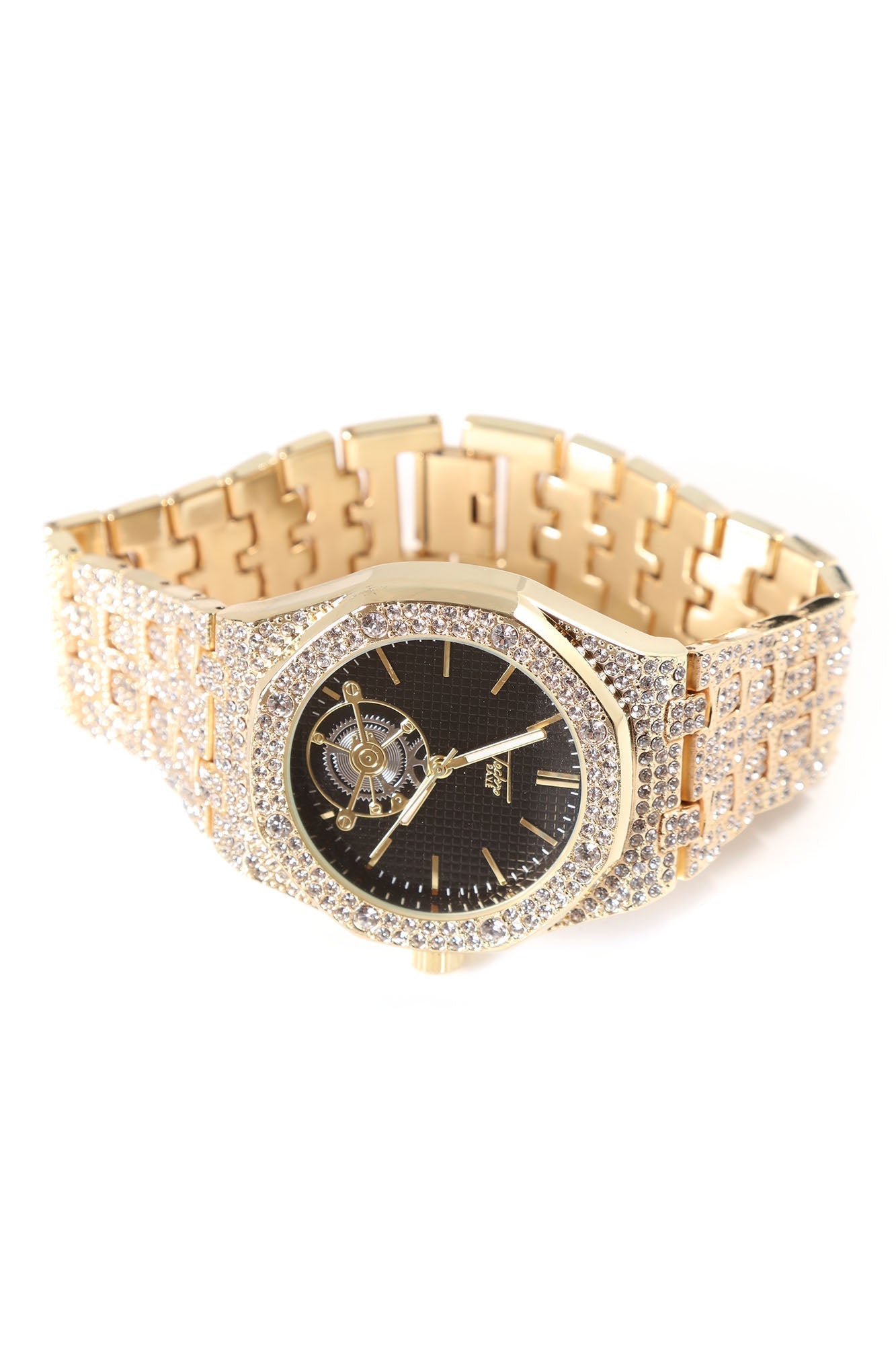 A gold-tone watch with a black dial and a bracelet covered in clear crystals, shown on a plain white background.